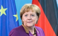 Trump ủng hộ NATO, gây áp lực với bà Merkel về chi tiêu quốc phòng