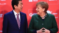 Thủ tướng Nhật Bản thúc giụcThủ tướng Đức thảo luận về tự do thương mại