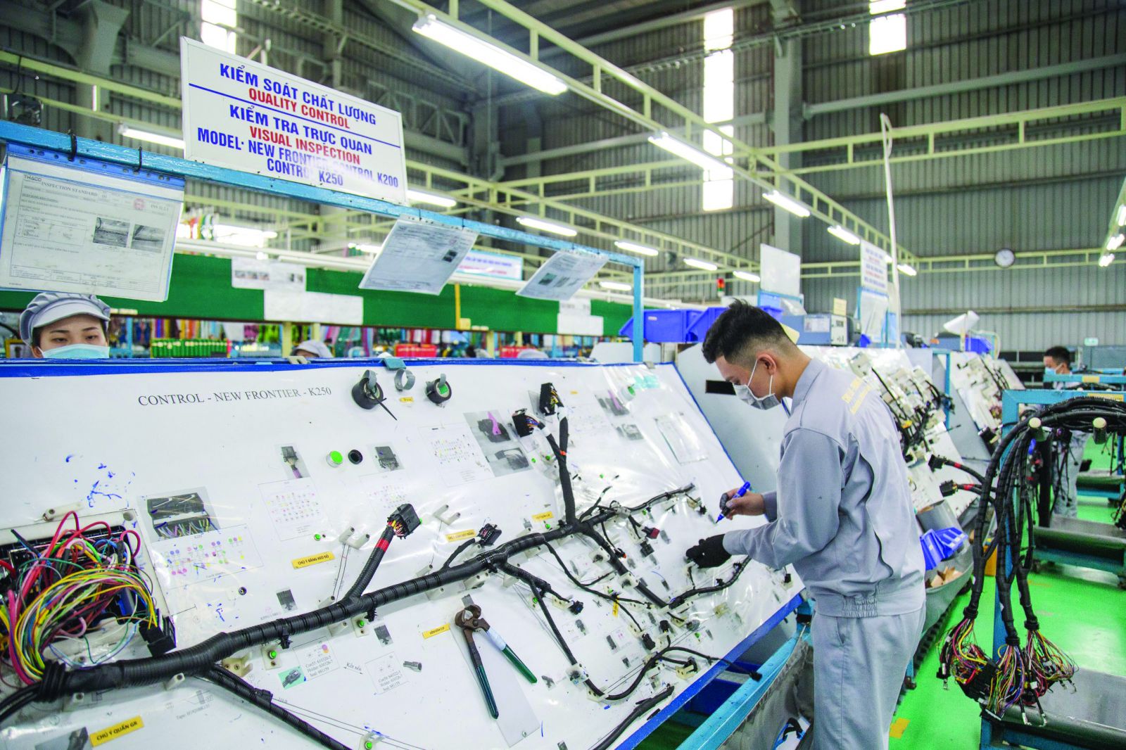  Sản xuất phụ tùng điện ô tô tại Tổ hợp nhà máy công nghiệp hỗ trợ Thaco Industries. Ảnh: Thaco