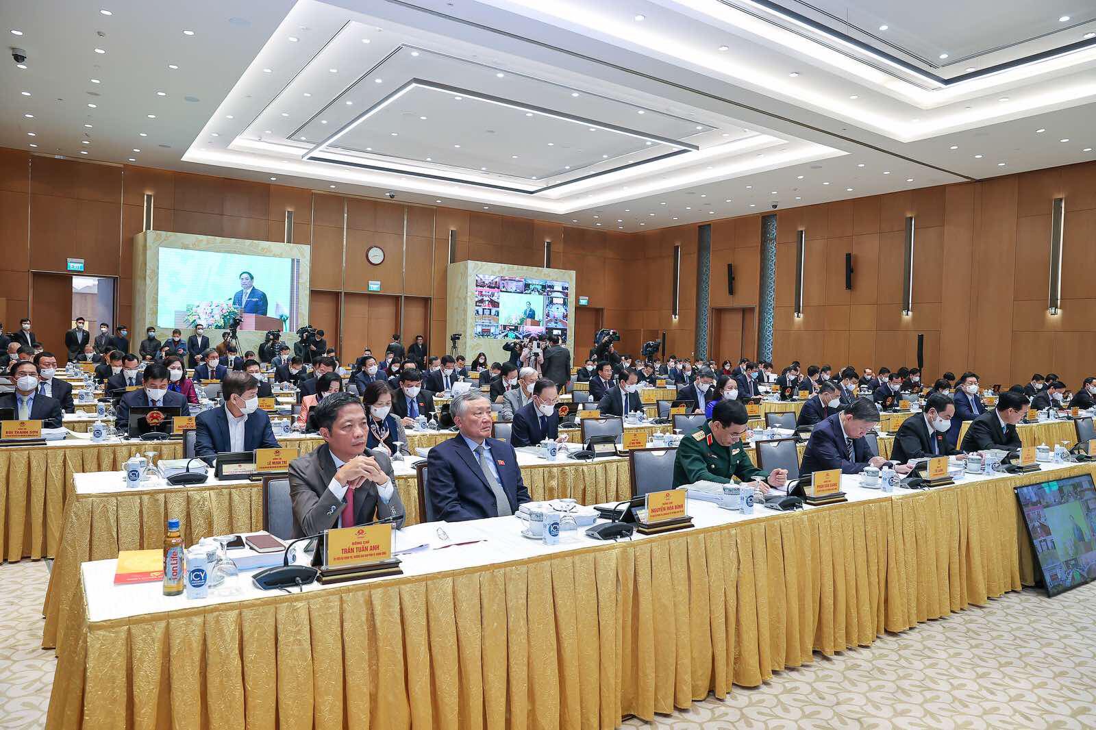 Các đại biểu dự Hội nghị tại điểm cầu Trụ sở Chính phủ, Thủ đô Hà Nội. Ảnh: VGP/Nhật Bắc