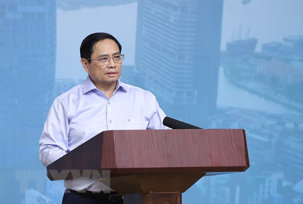 Thủ tướng Phạm Minh Chính chủ trì hội nghị thúc đẩy phát triển nhà ở xã hội cho công nhân và người thu nhập thấp. (Ảnh: Dương Giang/TTXVN)
