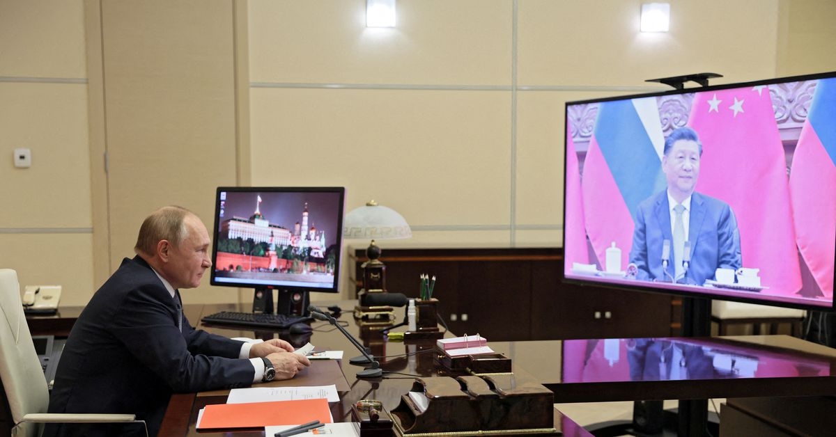 Tổng thống Nga Vladimir Putin trao đổi với Chủ tịch Trung Quốc Tập Cận Bình