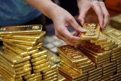 Giá vàng thế giới mất mốc 1.700 USD/ounce