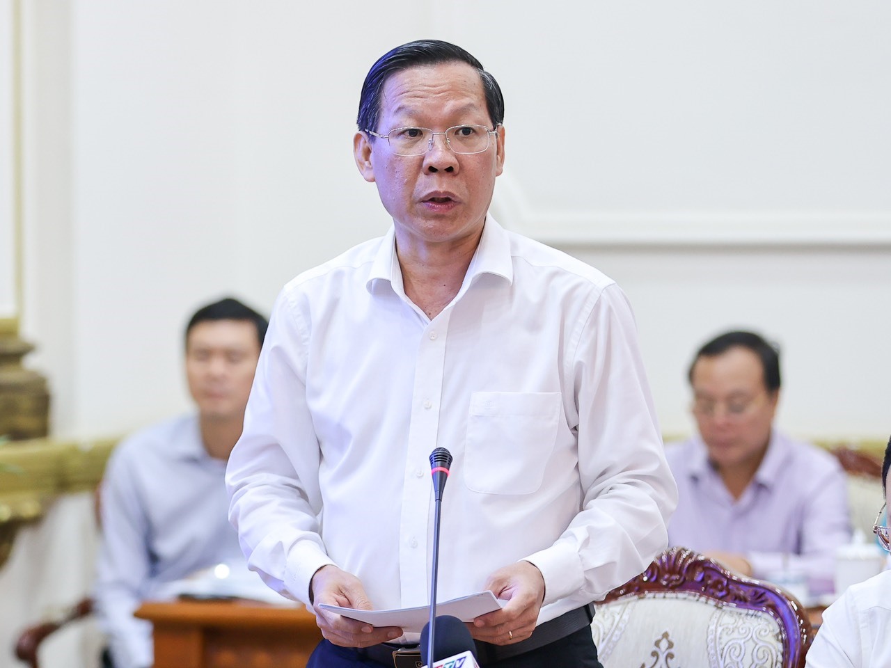 Chủ tịch UBND TP.HCM Phan Văn Mãi báo cáo Thủ tướng tại buổi làm việc - Ảnh: VGP/Nhật Bắc.