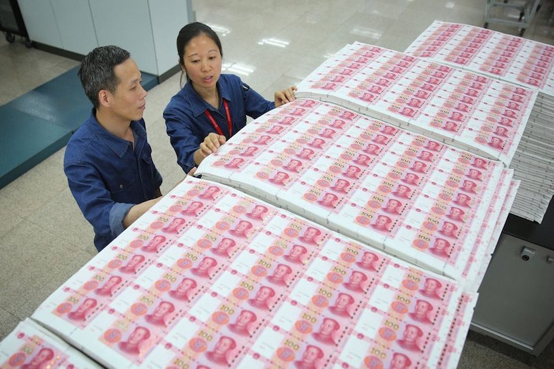 Khoản cho vay ngân hàng mới của Trung Quốc đạt kỷ lục 19,95 nghìn tỷ nhân dân tệ (3,1 nghìn tỷ USD) trong năm, tăng 1,6% so với 19,63 nghìn tỷ nhân dân tệ vào năm 2020 (ảnh: AFP)