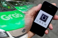 Uỷ ban cạnh tranh Singapore điều tra thương vụ Grab mua Uber