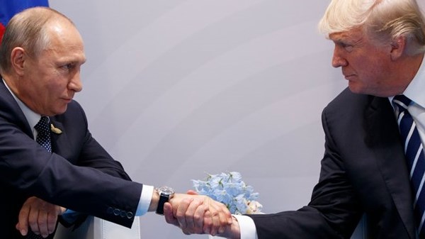 Lãnh đạo Nga - Mỹ gặp nhau tại Phần Lan. Ảnh: AP