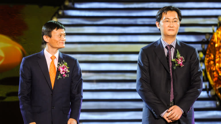 Jack Ma của Alibaba, trái, và Pony Ma của Tencent năm 2009: Hai ông trùm công nghệ có quan điểm rất khác nhau về điện toán đám mây hồi đó. © AP