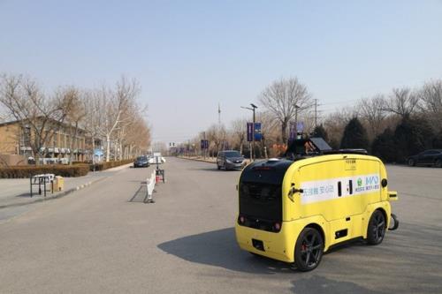 Xe robot giao hàng tự hành của dịch vụ giao hàng trực tuyến Meituan Dianping. 