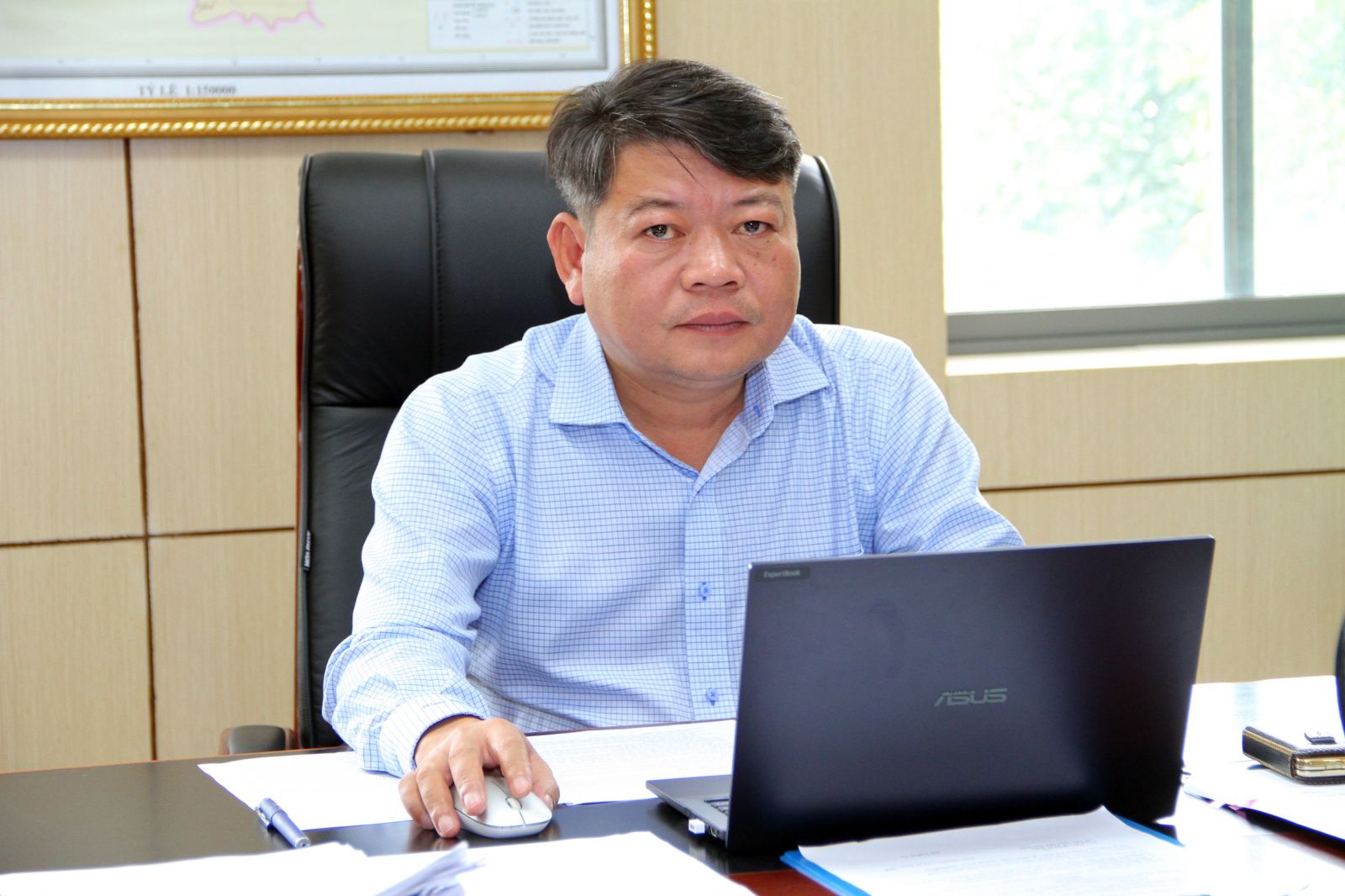 Phó Tổng Giám đốc Phụ trách điều hành Công ty cổ phần Gỗ MDF VRG Quảng Trị - Hồ Nghĩa An trao đổi với phóng viên Diễn đàn Doanh nghiệp (Ảnh: Vũ Phường)